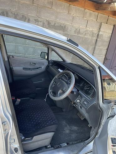 на ходу дымит: Honda Odyssey: 1996 г., Бензин, Минивэн — 6