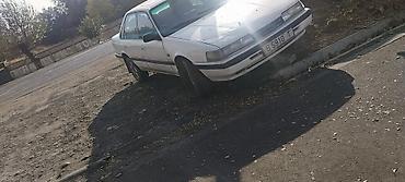 Транспорт: Mazda 626: 1990 г., 2 л, Механика, Бензин, Седан — 5