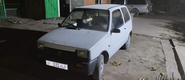 мини электромобиль: Компактный городской хэтчбек 3 двери, белый цвет, левый руль