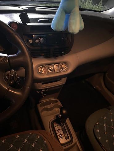 каптива 2008: Nissan Tino: 2001 г., 2 л, Автомат, Газ, Хэтчбэк — 4