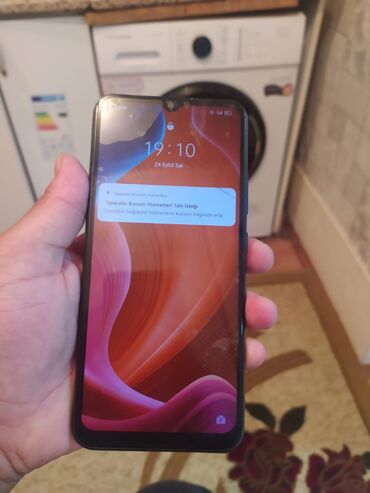 diğer telefonlar: Realme C21, 32 GB, rəng - Qara, Sensor, Barmaq izi, Simsiz şarj