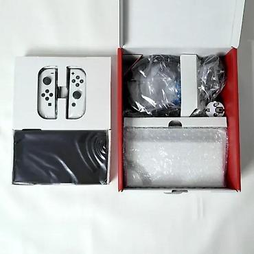 uticnica za ta pec: Uz konzolu dolazi: Tablet (konzola) Dock (postolje za TV) Joy-Con — 4