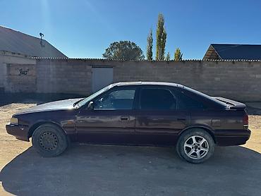 bmw 535i: Mazda 626: 1990 г., Хэтчбэк — 5