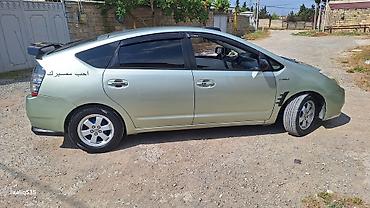 disk prius: Toyota Prius (2-ci nəsil) hibrid hetçbek Polnu Full maşındı. SAAT — 6