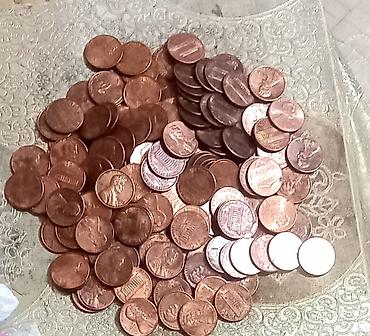 Sikkələr: 150 ədəd ABŞ 1 senti - ABŞ-da, əmək haqqının yüksək olması və kard — 8