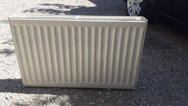 Elektrikli qızdırıcılar və radiatorlar: Kombi radiatoru. 1 ədəd 80 sm. Qiymət55 azn. Ünvan Qaracuxur(