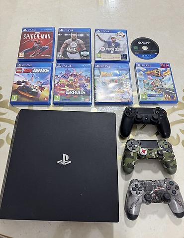 sony pla: Игровой комплект PlayStation 4 Slim (черный) с аксессуарами и играми — 1