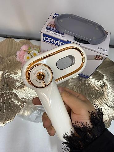 паровой утюк: Утюг Technomir, Паровой, Керамический, Вертикальное отпаривание — 9