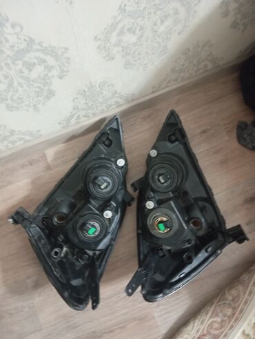 Передние фары: GX470 Lexus Фары левая -12000сом фара правая -9000сом Фара правая — 6