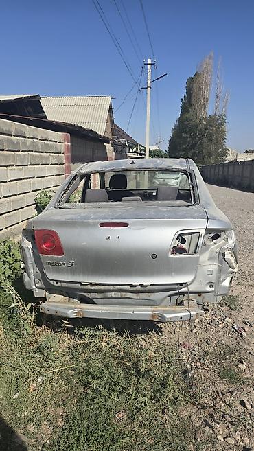 сиденийе: Кузов-остаток Mazda 3 (седан), серебристый. Описание: - Задняя часть — 1