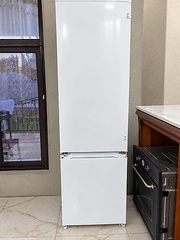 soyducu islenmis: Ağ rəngli ikiqapılı soyuducu - Dizayn: Minimalist, hamar ağ səth — 1