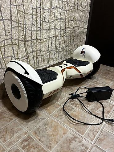 Электротранспорт: Elektroskuterl (hoverboard) – 8.5" təkərli, ağ rəngdə, LED işıqlı — 2