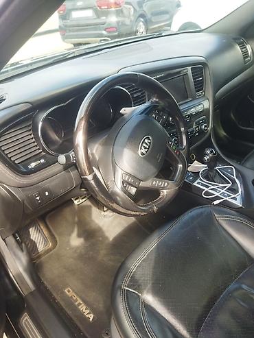 avtomobil qızdırıcı: Kia Optima SXL – biznes sinfi sedan - Korpusu: qara rəng, SXL paketi — 7
