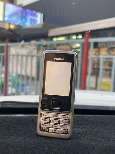 мужские ручные часы: Nokia 6300 4G, Б/у, < 2 ГБ, цвет - Серебристый, 1 SIM — 1