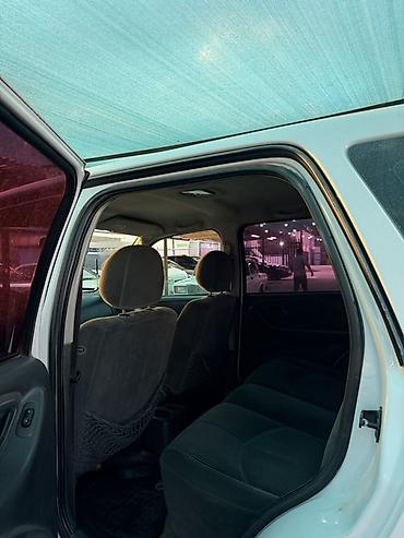 четырка цена: Mazda Tribute: 2004 г., 2 л, Механика, Бензин, Кроссовер — 3