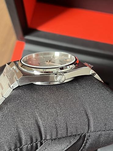 винтажное: Tissot PRX — швейцарские кварцевые часы с интегрированным стальным — 9