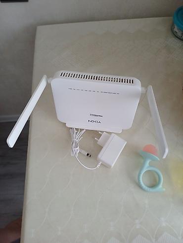 tp link 2 antenli modem: Nokia Wi‑Fi router - Rəng: ağ - İki xarici antena – siqnalın daha — 2