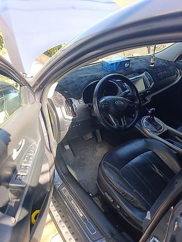 kia cerato manitoru: Kia Sportage (III nəsil) krossover - Kuzov: tünd-boz rəng, 5 qapı - — 5