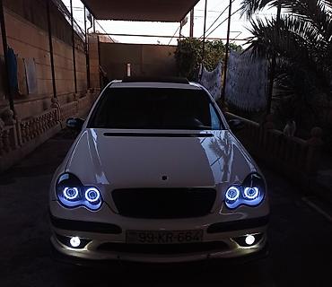 lexus 2018 qiymeti: Ağ rəngdə sedan, idman üslubunda eksteryer paketli. - Ön bamperdə — 3