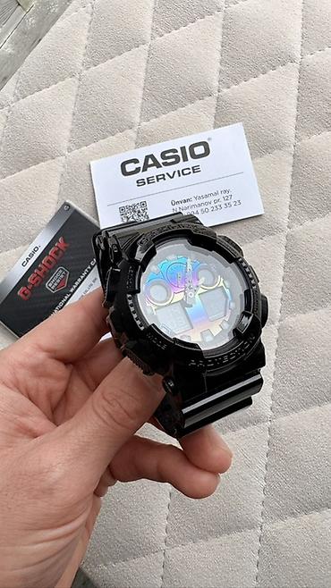g shock: Casio G-Shock qol saatı. Qara rəngli, iri korpuslu və idman üslublu — 6