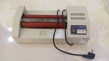 Laminatorlar: FGK 230 modeli laminator. Bu cihaz sənədləri və digər materialları — 1