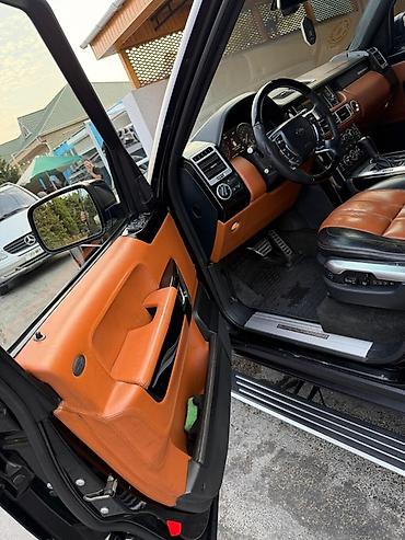 ag 07 sekilleri: Range Rover (L322) – qara rəng, tam ölçülü lüks SUV. Xüsusiyyətlər: - — 5