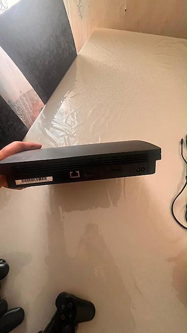 Видеоигры и приставки: Sony PlayStation 3 (PS3) Slim oyun konsolu Xüsusiyyətlər: - Rəng — 2