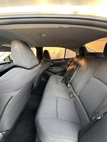 byd e2: Toyota Corolla: 2022 г., 1.8 л, Автомат, Гибрид, Седан — 5