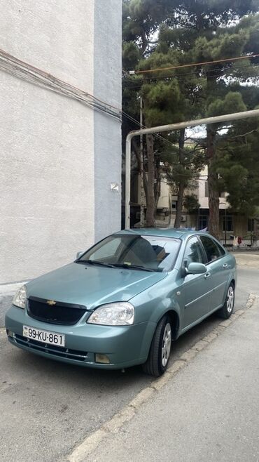 Chevrolet: Chevrolet Lacetti: 1.6 l | 2004 il Sedan — 8