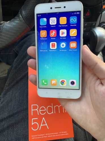 sumqayıt telefonlar: Xiaomi Redmi 5A, 2 GB, rəng - Qızılı, 
 Zəmanət, Sensor, İki sim kartlı