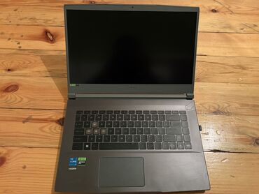 1 tb hard disk: MSI Thin 15 (Grey) noutbuk - 15.6" ekran (incə çərçivə, mat panel) -