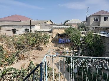 savalanda torpaq: Torpaqda köhnə tikili kürsülü ev var ancaq qiymətə daxil deyil. Torpaq — 9