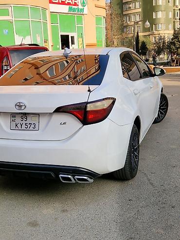 corolla 2006: Toyota Corolla, ağ rəng,sedan gövdə. I - Nömrə nişanı: 99-KY-573 — 5