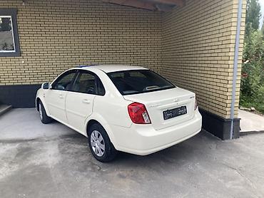токмок бетон: Chevrolet : 2014 г., 1.6 л, Кол менен иштөөчү, Бензин, Седан — 3