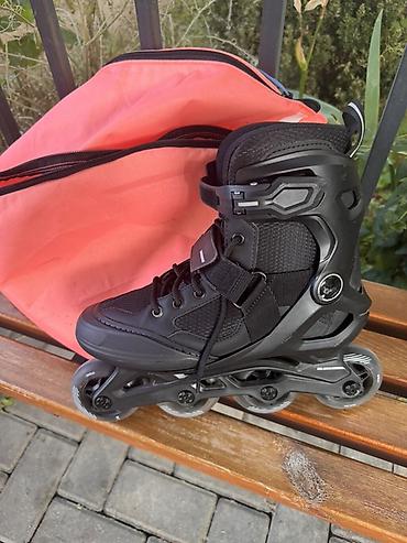 Inline skeytlər (roller skates) – 4 təkərli, qara rəng. - Ölçü: 38