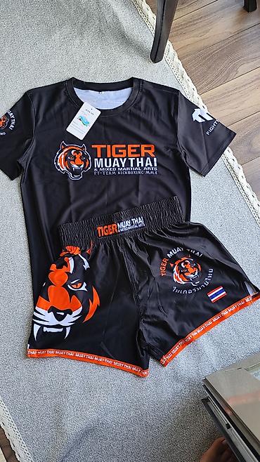 тигил: Комплект экипировки Tiger Muay Thai - Состав: футболка и шорты для — 1
