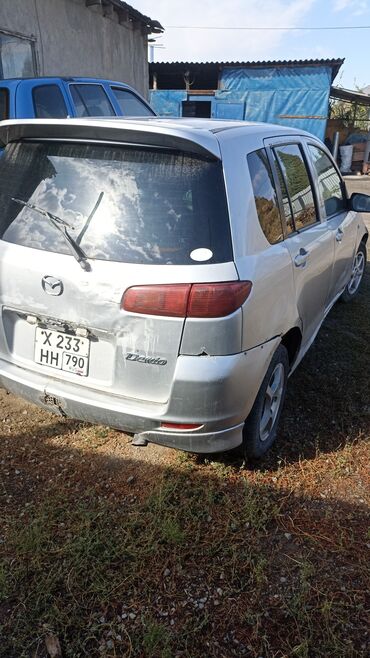 дверь субару форестер: Mazda Demio: 2002 г., Хэтчбэк