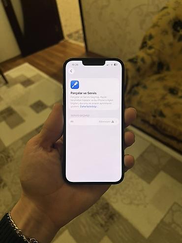 Apple iPhone: IPhone 13, Qara — 9