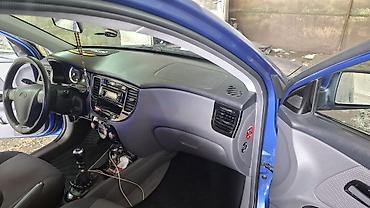 Kia: Kia Rio hatchback – mavi rəng, 5 qapı, şəhər üçün ideal kompakt — 10