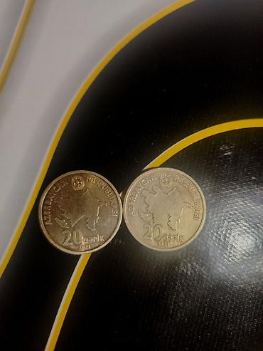 1000 manat nece rubl edir: Məhsul: Azərbaycan Respublikası 20 qəpik sikkələri (2 ədəd) Təsvir: - — 1