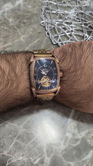 qol saati mexanika: Parmigiani Fleurier tərzində lüks qol saatı - Korpus: yastı (tonneau) — 2