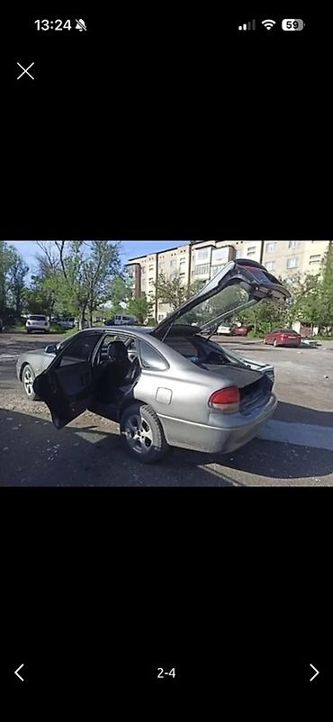 обвес 6 3: Mazda 626: 1992 г., 2 л, Механика, Бензин, Лифтбек — 4