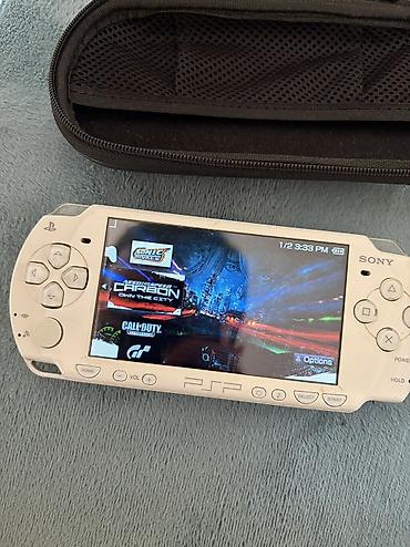 pes 5: Sony PSP-3000, ağ rəng (UMD sürücülü, PSP loqolu arxa qapaq). Portativ — 5