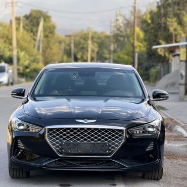 крутые машины: Элегантный черный седан Genesis G70 с динамичным дизайном и