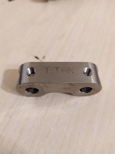 Titan markalı metal birləşdirici/keçid detalları - Material