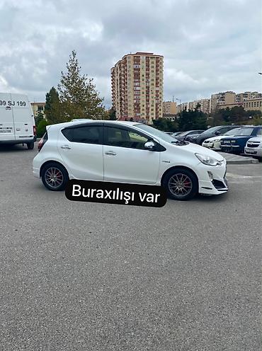sprinter satisi: Toyota Aqua Hybrid – ağ rəngli, şəhər üçün ideal kompakt hetçbek — 10