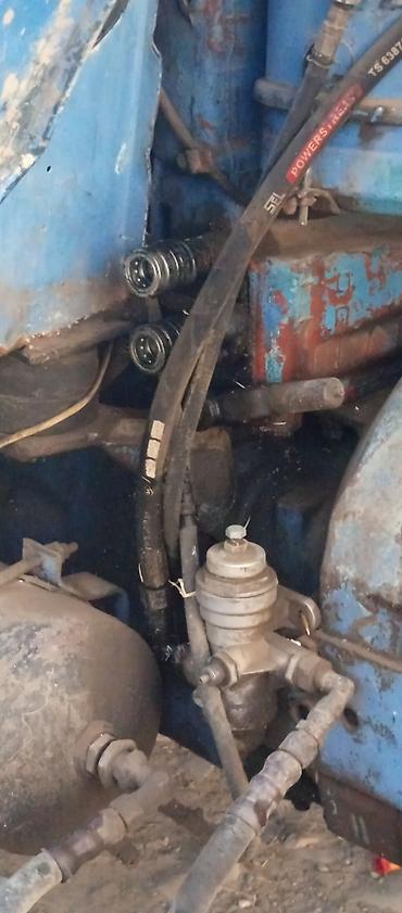 Traktorlar: Mavi rəngli təkərli kənd təsərrüfatı traktoru Texniki xüsusiyyət və — 7