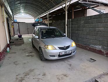 механика коробка: Mazda Demio: 2003 г., 1.5 л, Автомат, Хэтчбэк — 1