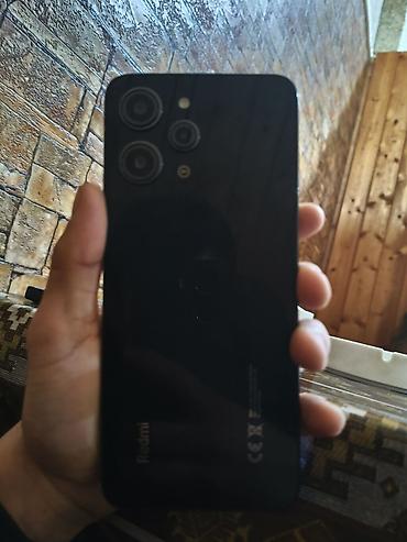 redmi 12 s: Redmi 12, 128 GB, rəng - Qara, Barmaq izi — 1