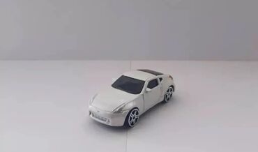ağ şalvar: Təcili Satılır. Endirim Var. Nissan 370z Cupe modelka satılır.Ağ